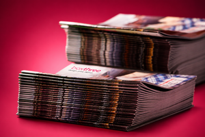 Stack of magazines on a red background